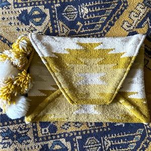 Anthropologie Envelope Clutch w/pompoms. Aztec print in Cream/Yellow.